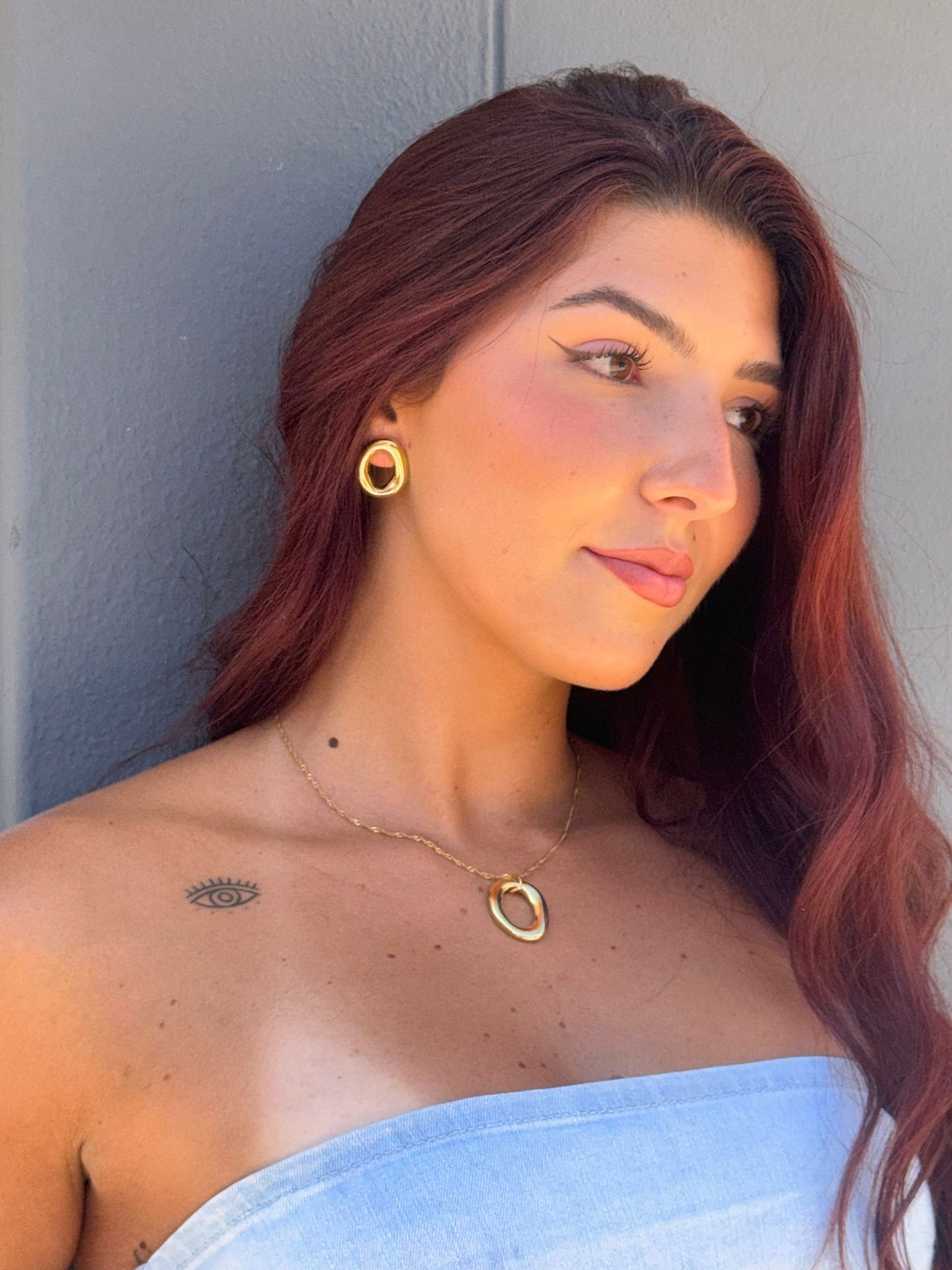 Brincos Golden Ellipse